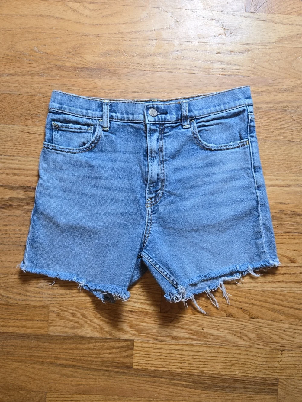 Faherty Indigo Dyed light distress high rise denim cutoff shorts